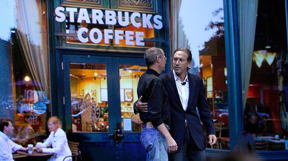 Apple CEO Steve Jobs and Starbucks founder Howard Schultz