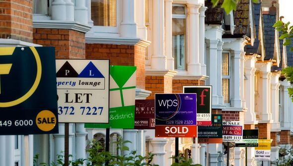 For sale signs outside residential properties