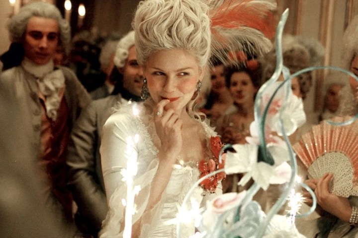 Kirsten Dunst smirks in Marie Antoinette.