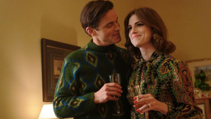 Matt Bomer and Allison Williams as Hawk and Lucy Fuller at a party in Showtime's Fellow Travelers.