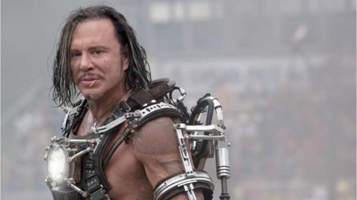 Mickey Rourke as Ivan Vanko in his Whiplash costume looking to his left in Iron Man 2.