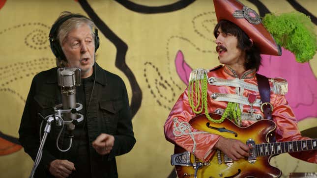 A young George Harrison and old Paul McCartney "perform" together. 