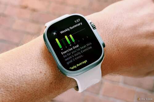 Apple Watch Ultra 2 with amount of exercise per week on screen