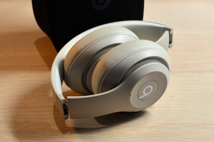 Beats Studio Pro, folded, in front of case.