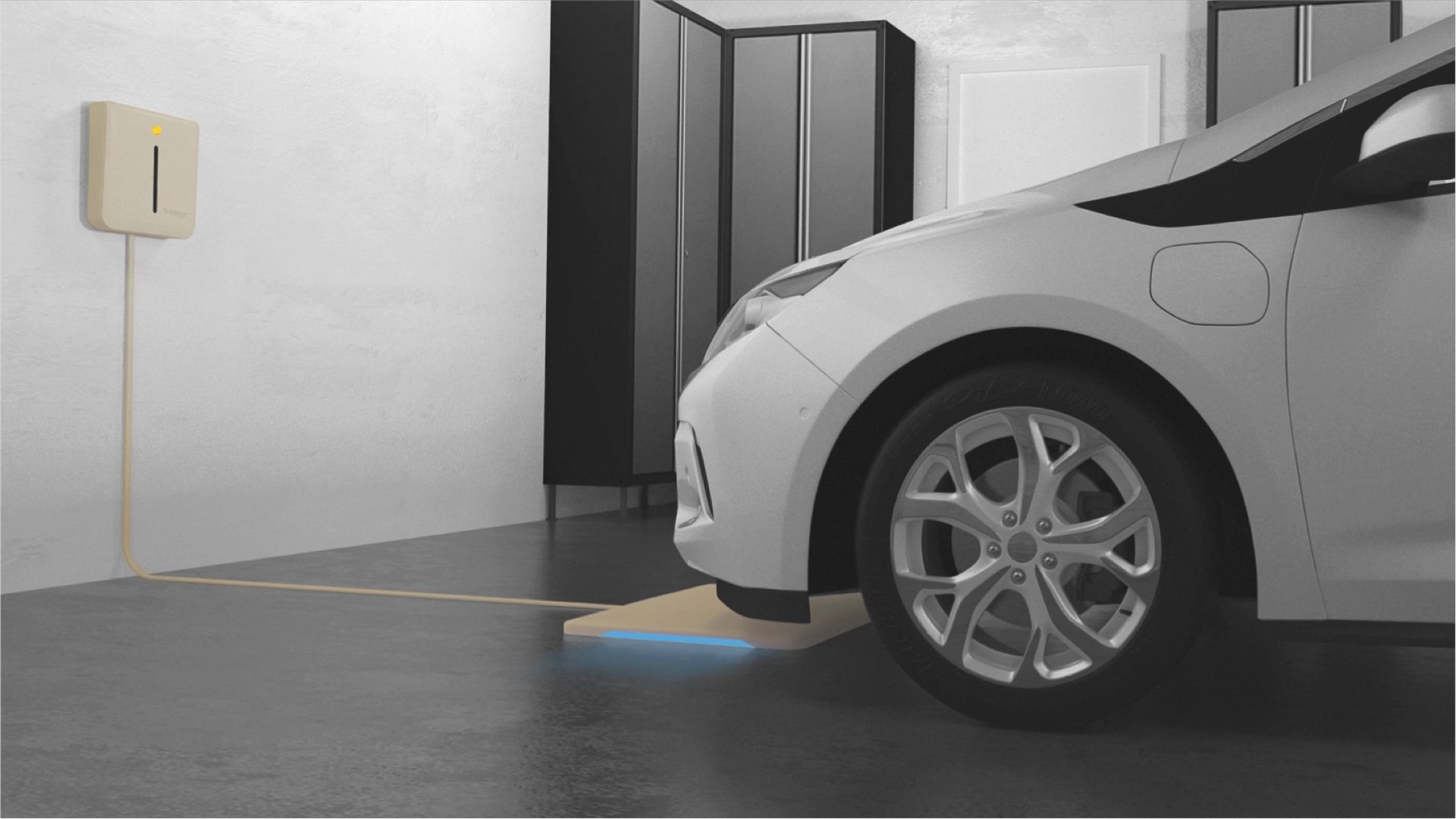 An EV using wireless charging in a home garage. 