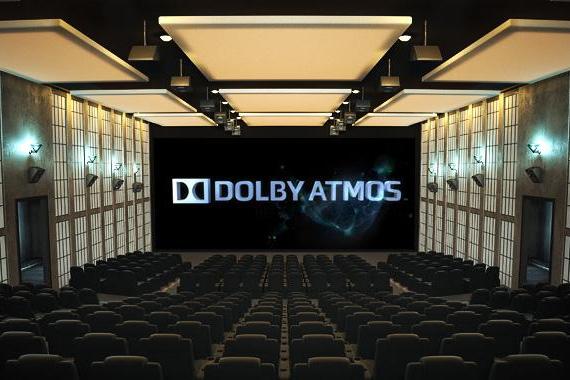 A theater with the Dolby Atmos logo displayed on the screen.