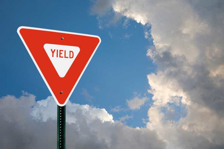 Yield Sign With Clouds