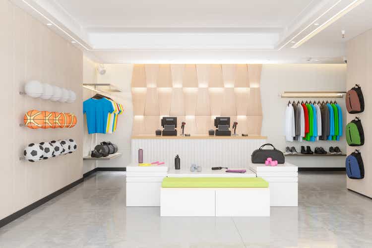 Sports Shop Interior With Sports Balls, Backpacks, Shoes And Sportswear