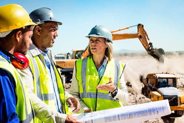 Construction team planning at quarry