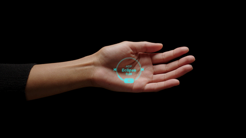 Humane Ai Pin projecting a visual onto a woman's palm