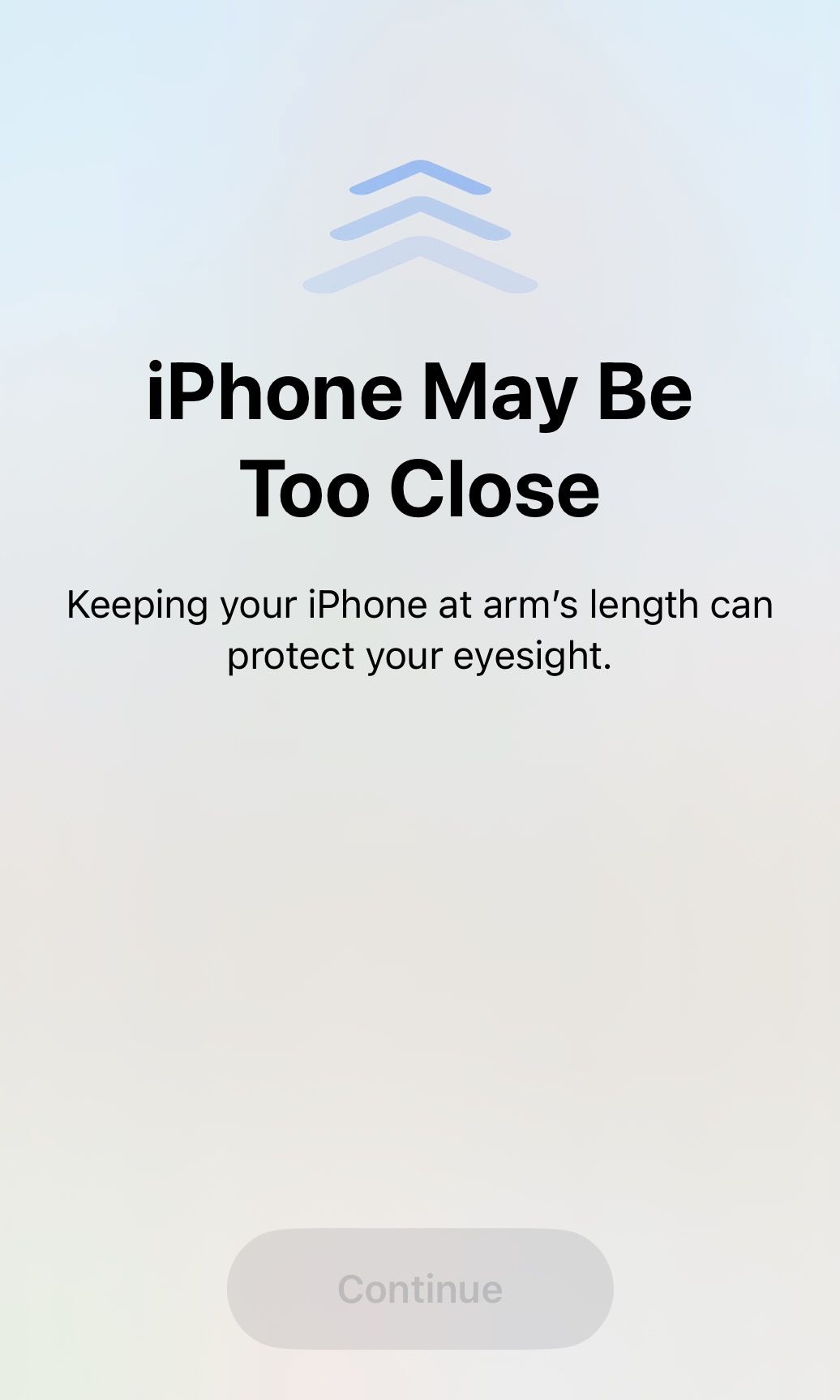 The image is a screenshot of the iPhone that shows the Screen Distance alert.