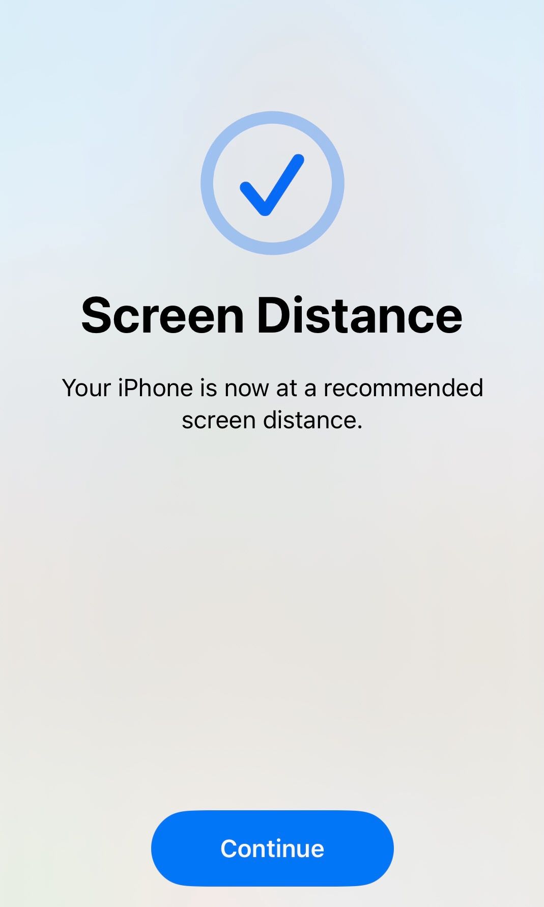 The image is a screenshot of the iPhone that shows the Screen Distance alert.