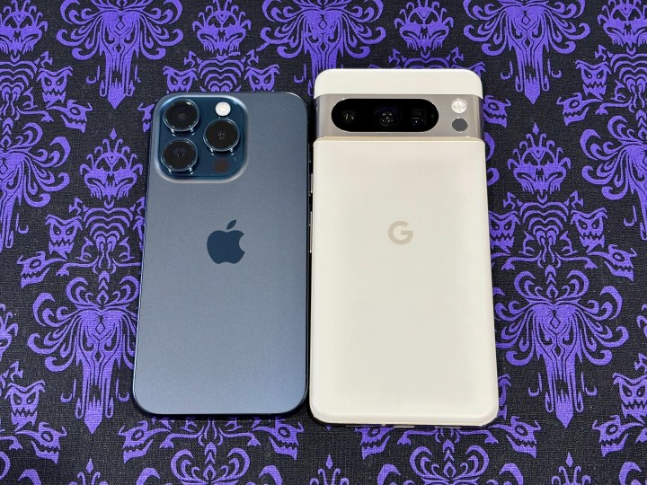 An iPhone 15 Pro in Blue Titanium (left) and Google Pixel 8 Pro in Porcelain side-by-side showing backs.