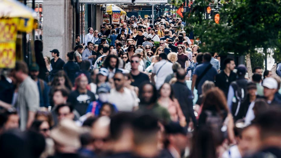 crowded sidewalks on Fifth Avenue