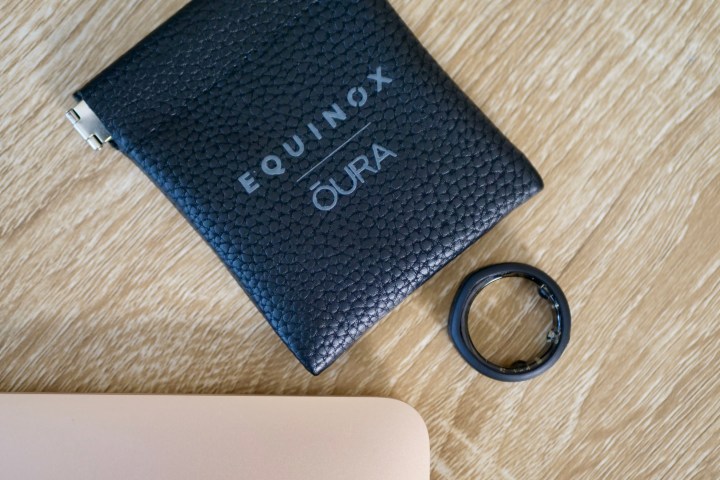 The Oura Ring in the Equinox Ring Cover, with the accessory pouch.