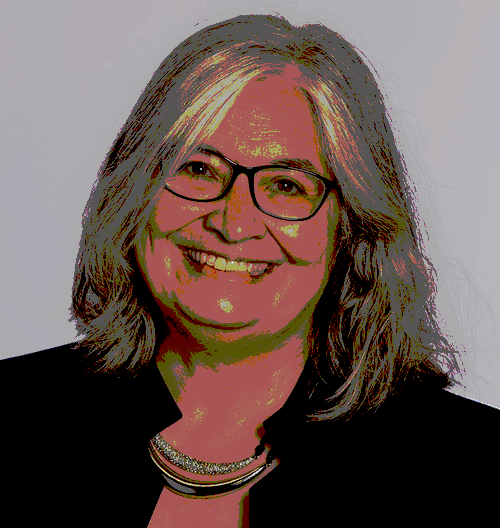 Portrait of a smiling woman with gray hair and glasses