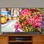 Roku TV on a wooden TV cabinet