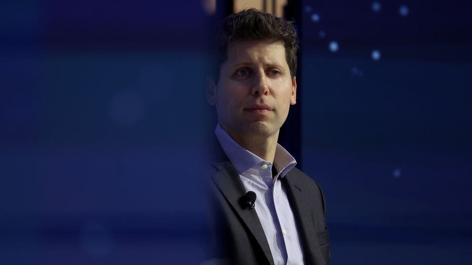 Sam Altman looks on at APEC summit