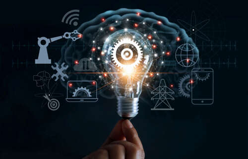 Hand holding light bulb and cog inside and innovation icon network connection on brain background.