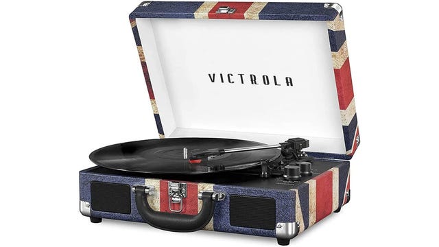 A vinyl record player in a union jack covered suitcase