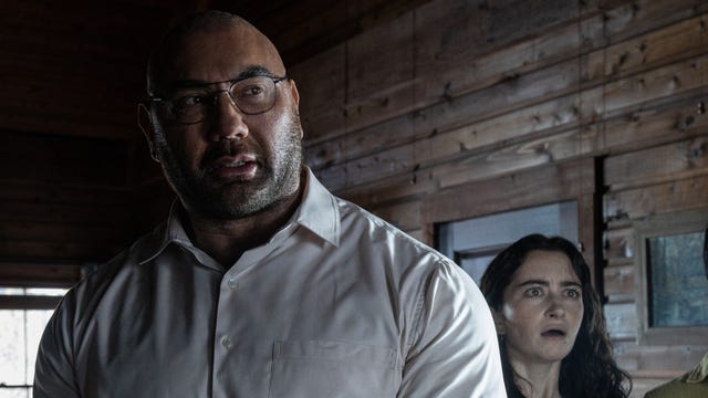 Dave Bautista looms in horror movie Knock at the Cabin.