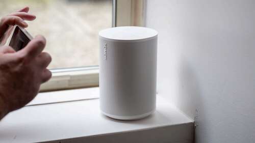 White Sonos Era 100 sitting on a shelf