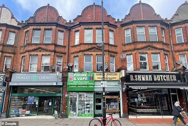 The second floor flat is part of a building in North London's Ballards Lane