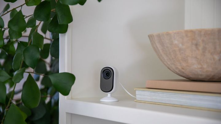 The Arlo Essential Indoor Camera Gen 2 on a countertop.