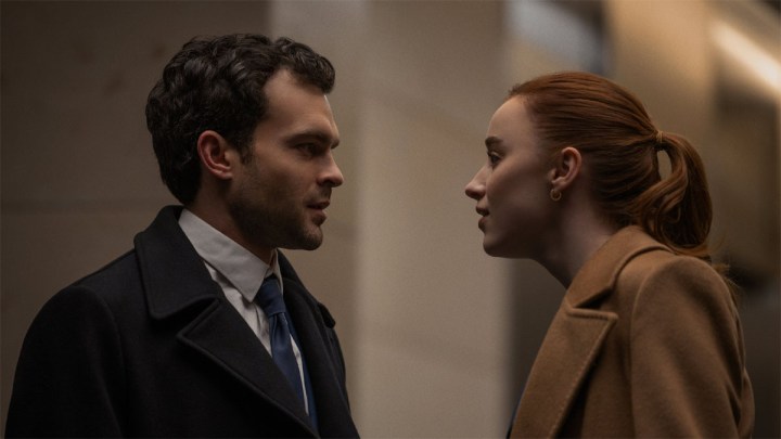 Alden Ehrenreich and Phoebe Dynevor as Emily and Luke talking in Fair Play.