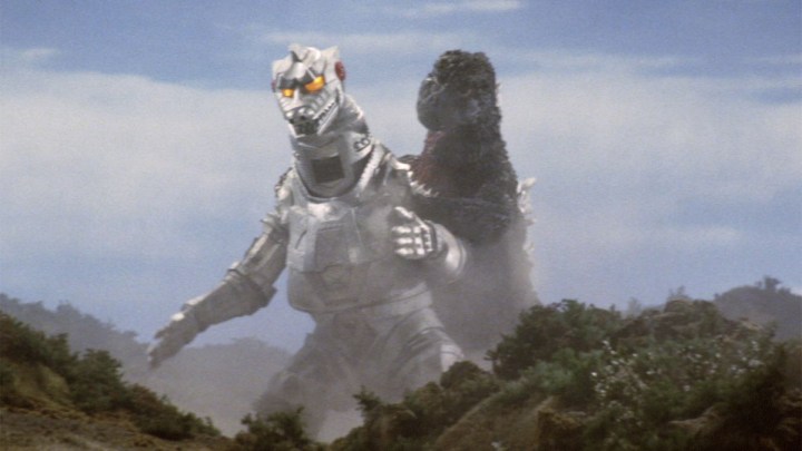 Godzilla attacks Mechagodzilla from behind in Godzilla vs. Mechagodzilla.