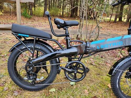 Lectric XP 3.0 with optional passenger kit including seat, foot pegs, and grab handle.