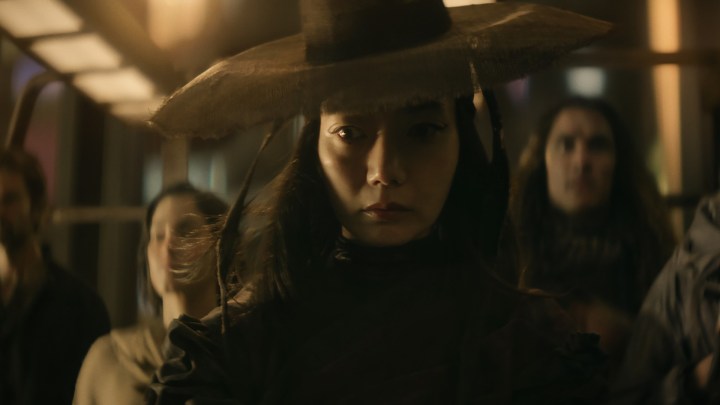 Doona Bae stands in a group of fellow heroes in a still from Rebel Moon – Part One: A Child of Fire.