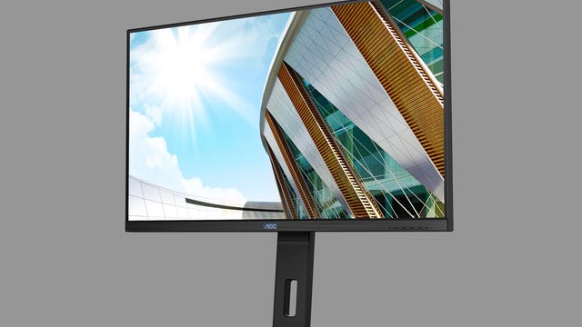 AOC U32P2CA monitor on a gray background