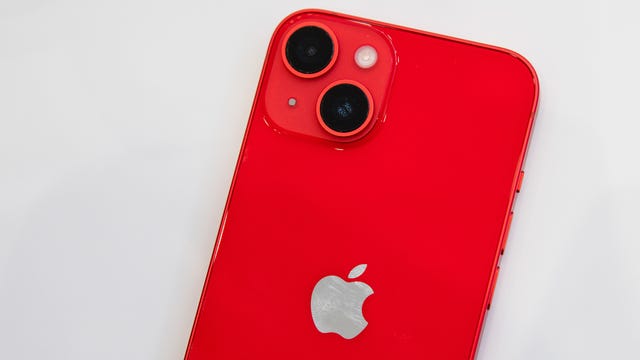 The rear of a red iPhone 14