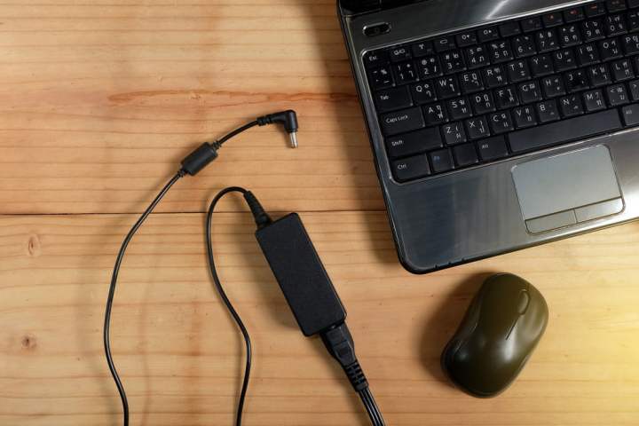 Top down view of a laptop power adapter.