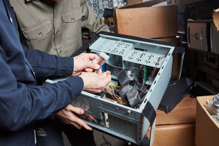 An individual building a desktop PC.