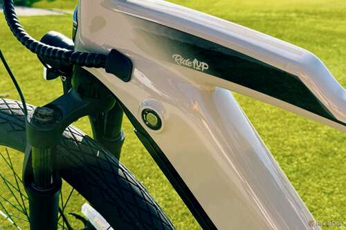 Close up of the suspension and battery lock on the Ride1Up Cafe Cruiser