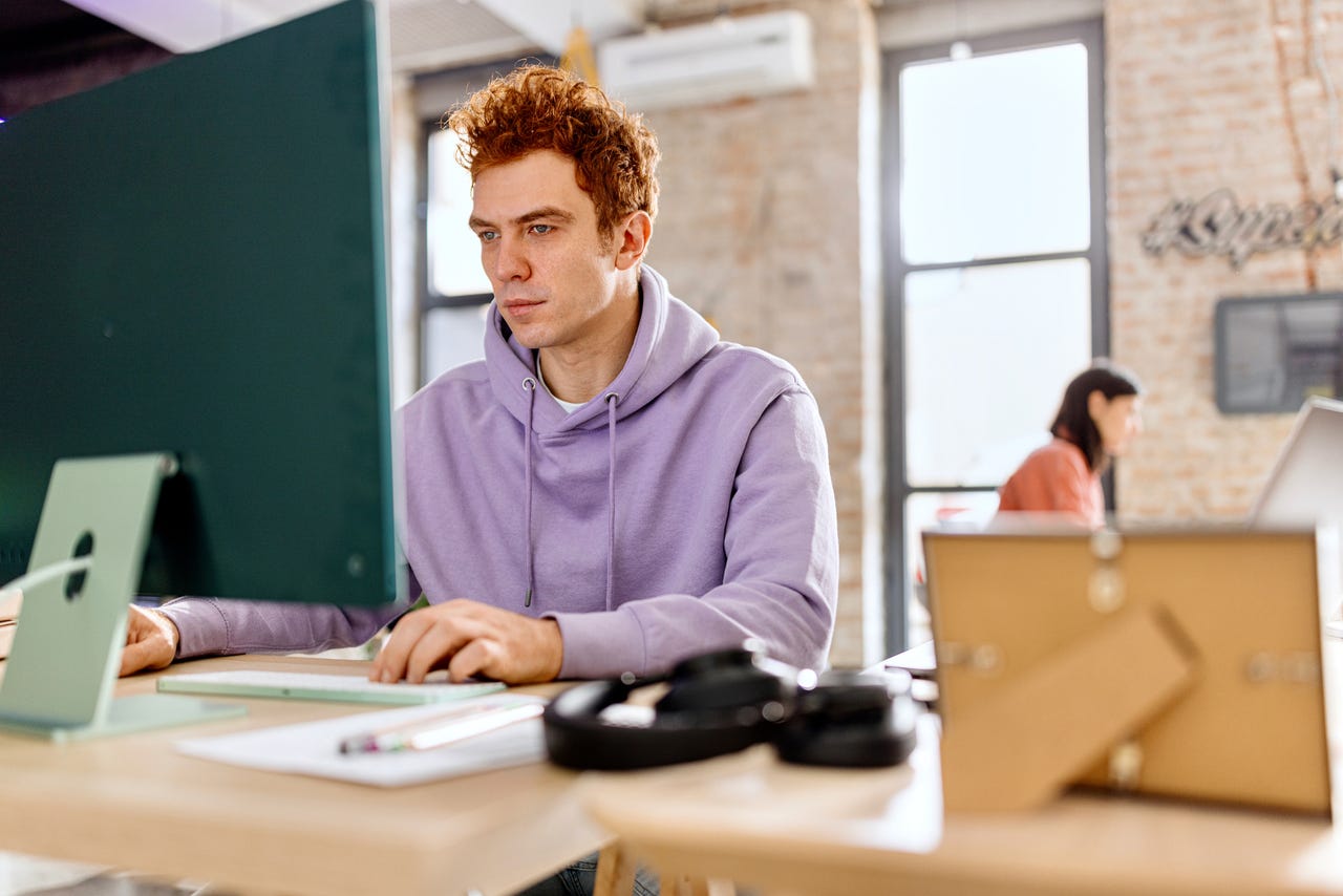 man working at computer