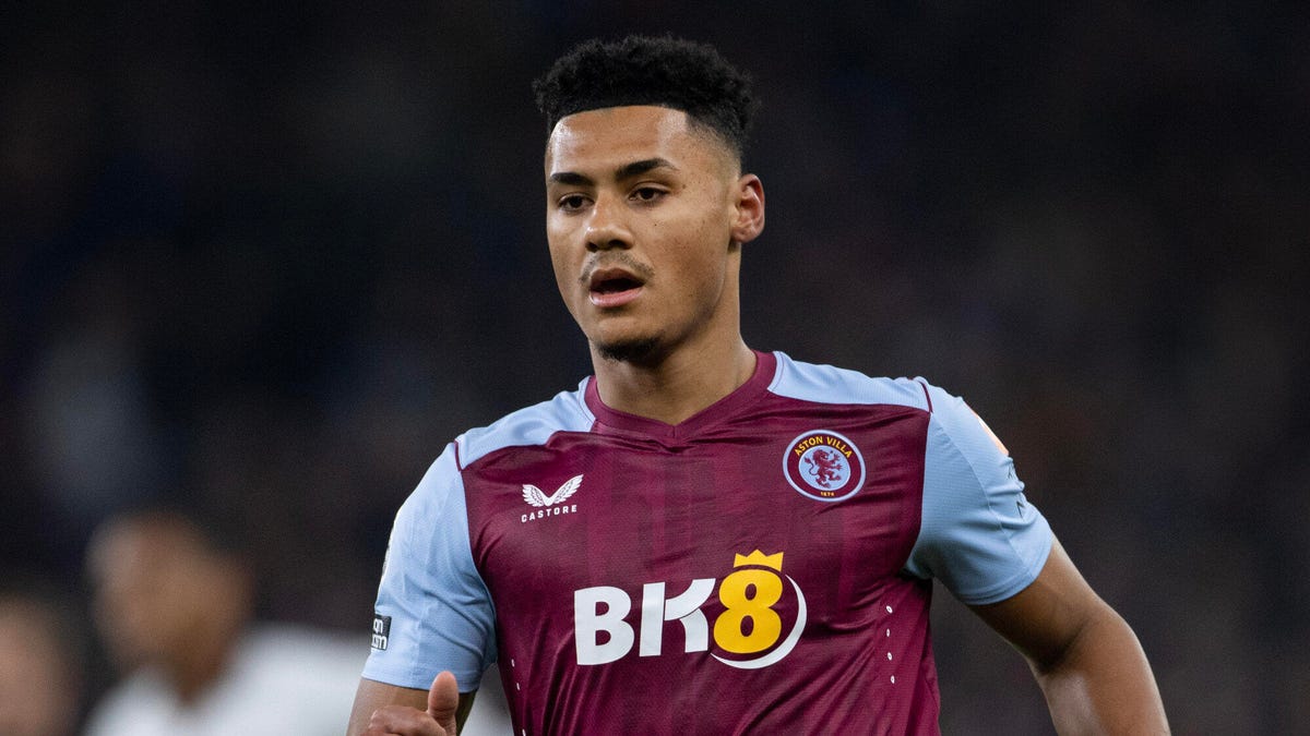 Aston Villa striker Ollie Watkins running towards the camera.