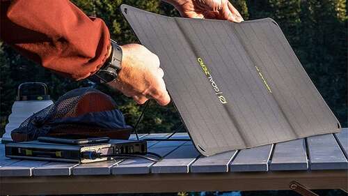 Goal Zero Solar charger being used on table