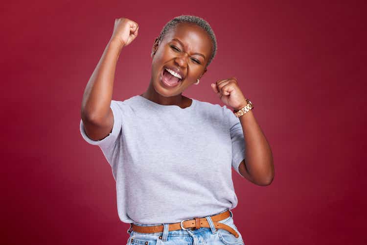 Celebration, black woman and excited person showing happiness and winner feeling. Winning motivation, achievement and happy smile of a female win with a celebrate victory feeling from success