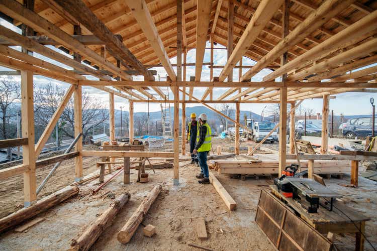 Construction workers in building site.