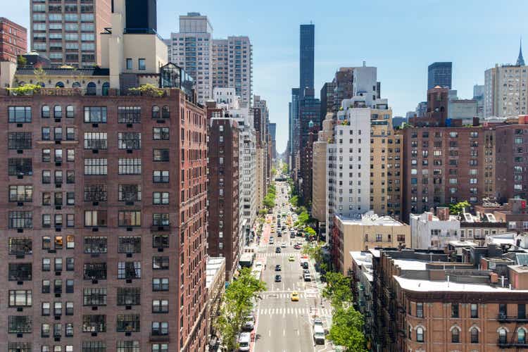 Overhead view First Avenue with traffic drivings through the buildings of Manhattan in New York City, seen from the Roosevelt Island Tramway