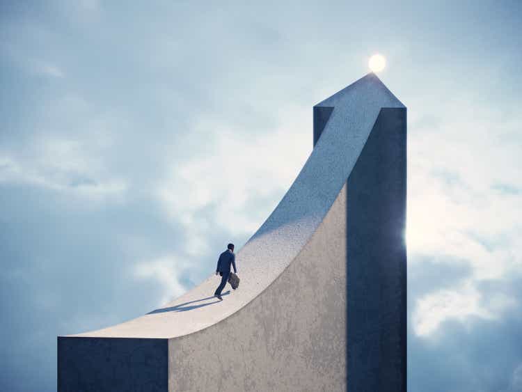 Business man running on arrow shaped bridge to the light