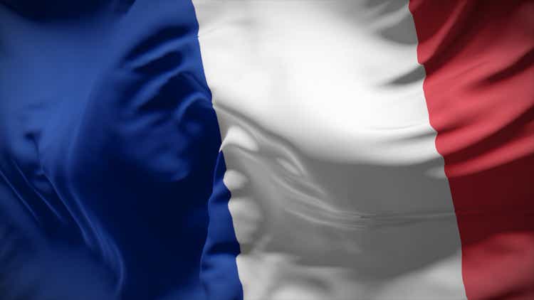 Close-up view of France national flag fluttering in the wind.