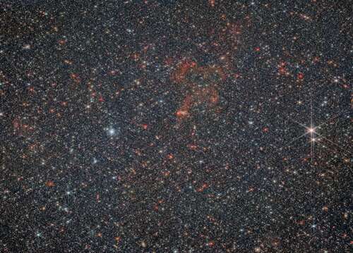 A dense star field in the relatively near galaxy NGC 6822.