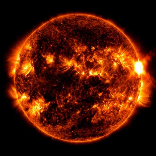 NASA’s Solar Dynamics Observatory snapped an image of a solar flare (seen as the bright flash on right) in August 2023.