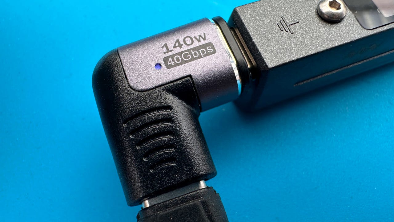 A magnetic breakaway USB-C connector on a blue background