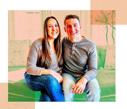 A woman and man wearing gray long-sleeve shirts and jeans, sitting on a couch