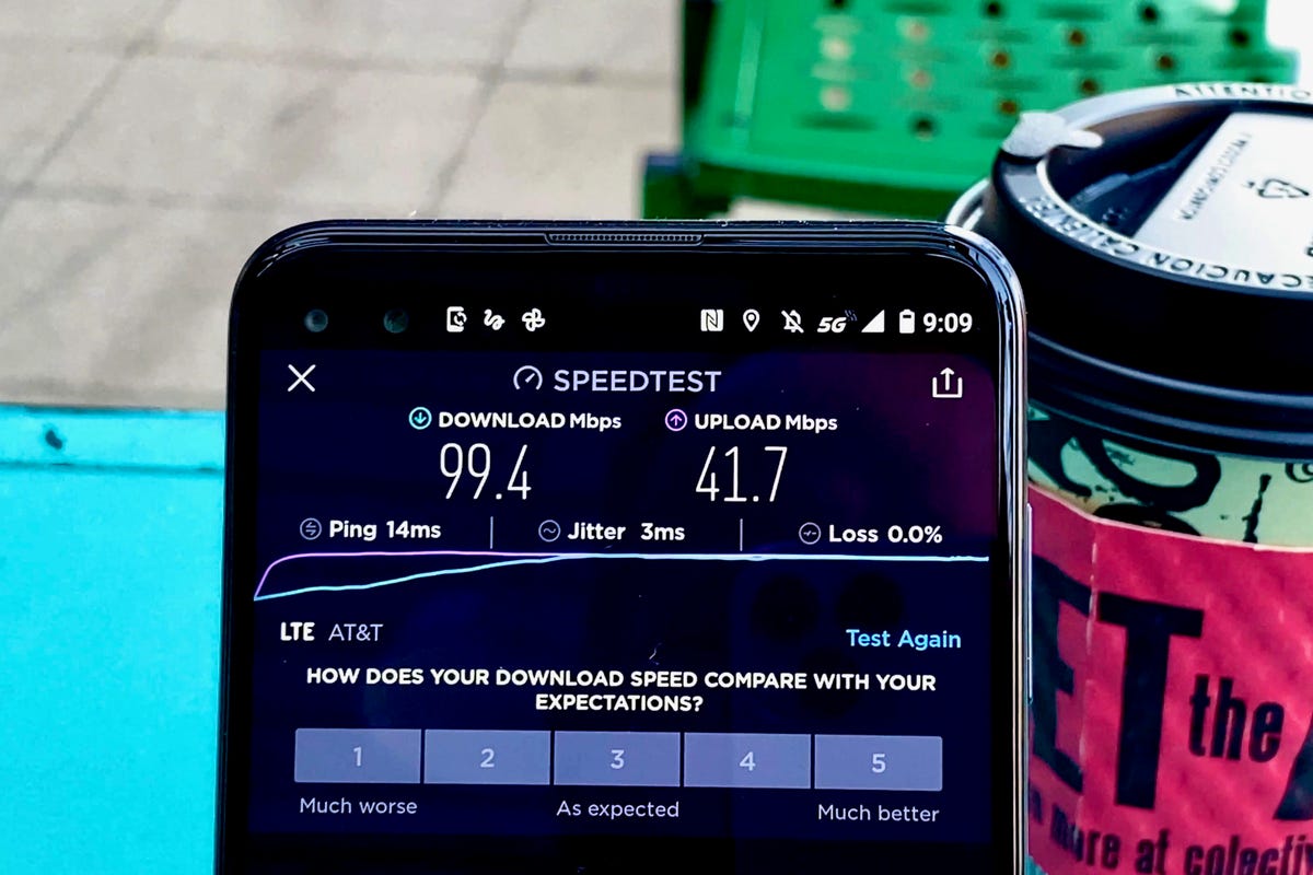 A phone with a speed test app open